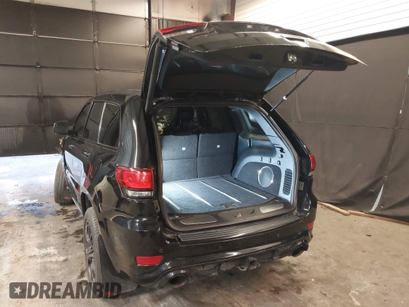 2017 Jeep Grand Cherokee SRT with VIN 1C4RJFDJ9HC819478, listed as a IAAI auction lot 41325490 with 63,551 mi miles. Bid and sale history available at carsss.com. Image 3.