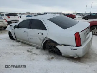 2011 Cadillac STS RWD z VIN 1G6DW6ED4B0120954, wystawiony jako Copart lot #42792695 z przebiegiem Nie podano mil oraz Szkoda całkowita • Salvage title. Historia ofert i sprzedaży dostępna na DreamBid. Obrazek 2.