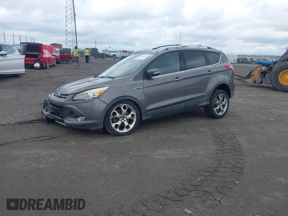 2013 Ford Escape Titanium with VIN 1FMCU0J92DUB36428, listed as a IAAI auction lot 42144682 with 263,600 mi miles and . Bid and sale history available at carsss.com. Image 2.