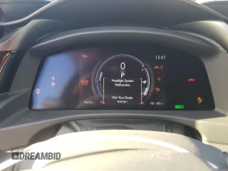 2023 Lexus RZ 450e Premium z VIN JTJAAAAB9PA007621, wystawiony jako Copart lot #80594143 z przebiegiem 7673 mil mil oraz Szkody całkowita. Historia ofert i sprzedaży dostępna na DreamBid. Obrazek 9.