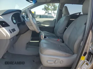 2012 Toyota Sienna XLE AAS with VIN 5TDYK3DC1CS204598, listed as a Copart auction lot 62293015 with 76,108 mi miles and Salvage title. Bid and sale history available at DreamBid. Image 7.