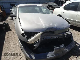 1999 Saturn SL z VIN 1G8ZK5271XZ316032, wystawiony jako Copart lot #50663015 z przebiegiem 164 288 mil mil oraz Nie do naprawy. Historia ofert i sprzedaży dostępna na DreamBid. Obrazek 5.