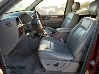 2006 GMC Envoy Denali with VIN 1GKES66M766163803, listed as a Copart auction lot 75289784 with 194,386 mi miles and Salvage Title. Bid and sale history available at DreamBid. Image 7.