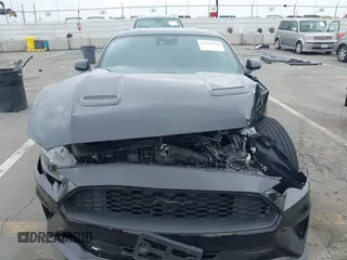 2021 Ford Mustang EcoBoost z VIN 1FA6P8TH7M5115490, wystawiony jako IAAI lot #42428724 z przebiegiem 47 417 mil mil oraz . Historia ofert i sprzedaży dostępna na DreamBid. Obrazek 12.