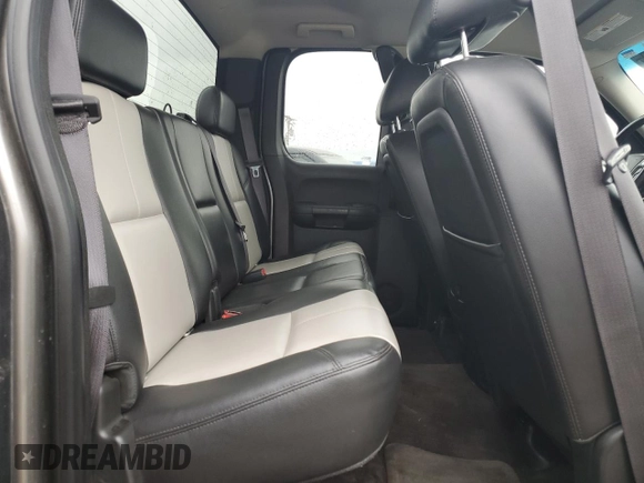 2012 GMC Sierra 1500 SLT z VIN 1GTR2WE74CZ262971, wystawiony jako Copart lot #85956964 z przebiegiem 105 004 mil mil oraz Czysty tytuł • Clean title. Historia ofert i sprzedaży dostępna na DreamBid. Obrazek 10.