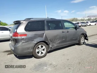 2012 Toyota Sienna LE AAS with VIN 5TDKK3DC6CS267895, listed as a Copart auction lot 53449855 with 114,699 mi miles and Salvage Title. Bid and sale history available at DreamBid. Image 3.
