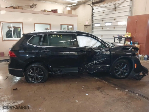 2022 Volkswagen Tiguan SE with VIN 3VV2B7AX0NM111869, listed as a IAAI auction lot 41621479 with 24,395 mi miles. Bid and sale history available at carsss.com. Image 14.