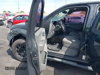 2014 Nissan Frontier SV with VIN 1N6AD0ER8EN756702, listed as a IAAI auction lot 42021294 with 135,143 mi miles and . Bid and sale history available at DreamBid. Image 5.