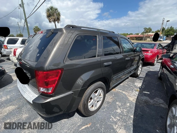2006 Jeep Grand Cherokee Laredo with VIN 1J4GS48K66C248812, listed as a Copart auction lot 55764035 with 210,259 mi miles and Clean Title. Bid and sale history available at carsss.com. Image 4.