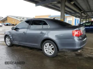 2007 Volkswagen Jetta z VIN 3VWDG71K47M101262, wystawiony jako Copart lot #51469695 z przebiegiem 241 174 mil mil oraz Szkoda całkowita • Salvage title. Historia ofert i sprzedaży dostępna na DreamBid. Obrazek 2.