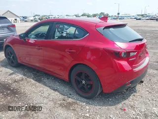 2014 Mazda 3 S Grand Touring with VIN JM1BM1M31E1150000, listed as a IAAI auction lot 42470302 with 186,187 mi miles and . Bid and sale history available at DreamBid. Image 3.