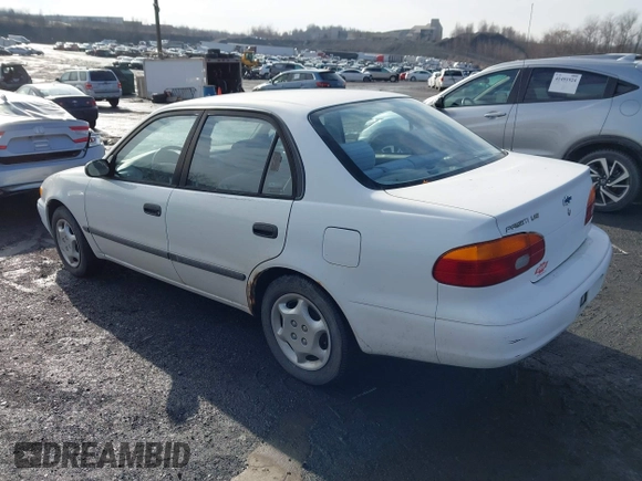 2001 Chevrolet Prizm z VIN 1Y1SK52871Z432340, wystawiony jako IAAI lot #41465388 z przebiegiem 122 272 mil mil oraz . Historia ofert i sprzedaży dostępna na DreamBid. Obrazek 3.