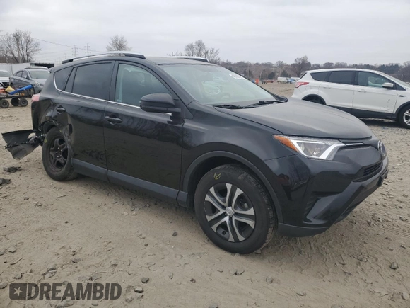 2016 Toyota RAV4 LE with VIN 2T3BFREV2GW454983, listed as a Copart auction lot 49323025 with 183,910 mi miles and Salvage Title. Bid and sale history available at DreamBid. Image 4.