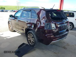 2012 Kia Sorento SX with VIN 5XYKW4A24CG207956, listed as a IAAI auction lot 40244776 with 112,703 mi miles. Bid and sale history available at carsss.com. Image 3.