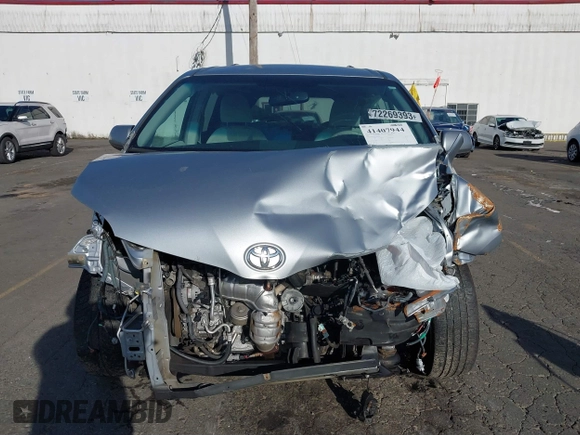 2014 Toyota Sienna LE with VIN 5TDJK3DC4ES088768, listed as a IAAI auction lot 41473251 with 100,512 mi miles and . Bid and sale history available at DreamBid. Image 6.