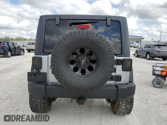 2018 Jeep Wrangler JK Unlimited Sport S with VIN 1C4BJWDG9JL860379, listed as a Copart auction lot 45628665 with 55,515 mi miles and Non Repairable. Bid and sale history available at carsss.com. Image 6.