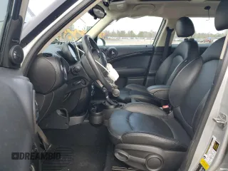 2016 MINI Countryman with VIN WMWZB3C50GWR48610, listed as a Copart auction lot 44028035 with 69,801 mi miles and Salvage title. Bid and sale history available at DreamBid. Image 7.