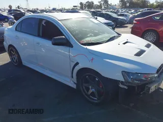 2012 Mitsubishi Lancer Evolution MR with VIN JA32W5FV3CU009679, listed as a IAAI auction lot 40787549 with 167,206 mi miles. Bid and sale history available at carsss.com. Image 1.