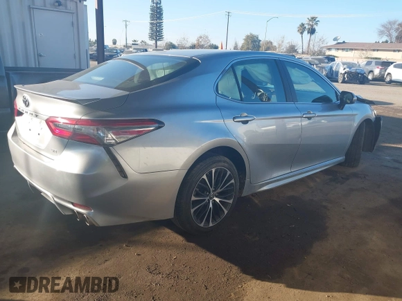 2018 Toyota Camry LE with VIN 4T1B11HK9JU068675, listed as a IAAI auction lot 41299139 with 144,675 mi miles. Bid and sale history available at carsss.com. Image 4.
