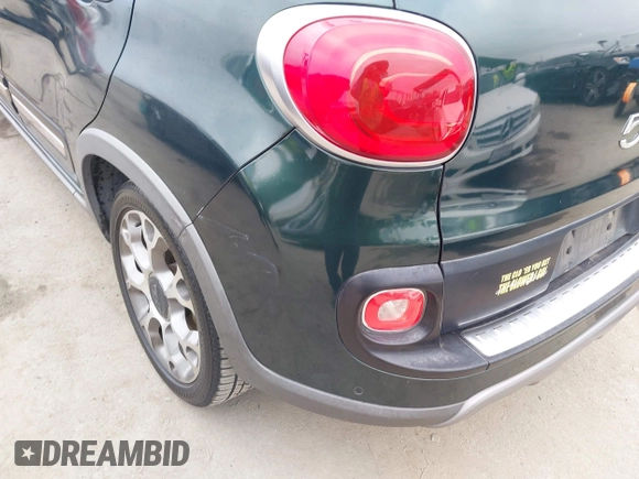2014 FIAT 500L Trekking with VIN ZFBCFADH0EZ007506, listed as a IAAI auction lot 42563872 with 126,535 mi miles and . Bid and sale history available at DreamBid. Image 6.