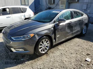 2017 Ford Fusion Energi SE with VIN 3FA6P0PUXHR191121, listed as a Copart auction lot 75680454 with 139,023 mi miles and Clean Title. Bid and sale history available at carsss.com. Image 1.