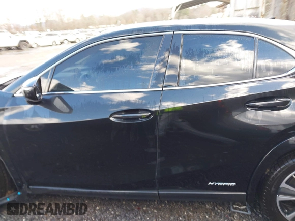 2021 Lexus UX 250h with VIN JTHX9JBHXM2042844, listed as a IAAI auction lot 41213573 with 31,650 mi miles and . Bid and sale history available at DreamBid. Image 14.