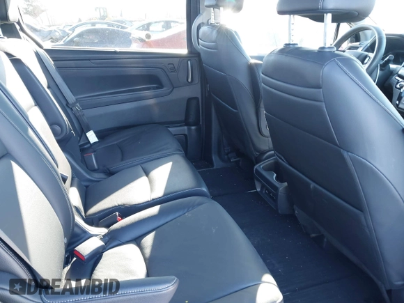 2023 Honda Odyssey Touring with VIN 5FNRL6H80PB005769, listed as a IAAI auction lot 41280858 with 7,041 mi miles and . Bid and sale history available at DreamBid. Image 8.