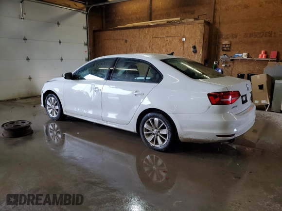 2015 Volkswagen Jetta SE with VIN 3VWD17AJ4FM308693, listed as a Copart auction lot 59987585 with 87,136 mi miles and Salvage title. Bid and sale history available at DreamBid. Image 2.