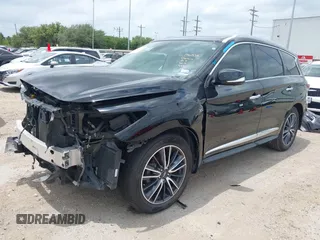 2020 Infiniti QX60 Pure with VIN 5N1DL0MM3LC524411, listed as a IAAI auction lot 42292734 with 51,221 mi miles and . Bid and sale history available at DreamBid. Image 2.