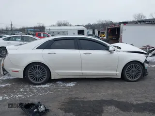 2014 Lincoln MKZ with VIN 3LN6L2J99ER819229, listed as a IAAI auction lot 41005075 with Not Provided miles. Bid and sale history available at carsss.com. Image 13.