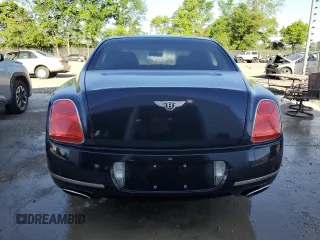 2011 Bentley Flying Spur z VIN SCBBP9ZA8BC067938, wystawiony jako Copart lot #55777645 z przebiegiem 47 613 mil mil oraz Tytuł czysty. Historia ofert i sprzedaży dostępna na DreamBid. Obrazek 6.