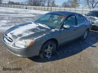 2002 Ford Taurus SEL with VIN 1FAHP56S82G144061, listed as a IAAI auction lot 41610496 with 100,106 mi miles. Bid and sale history available at carsss.com. Image 2.
