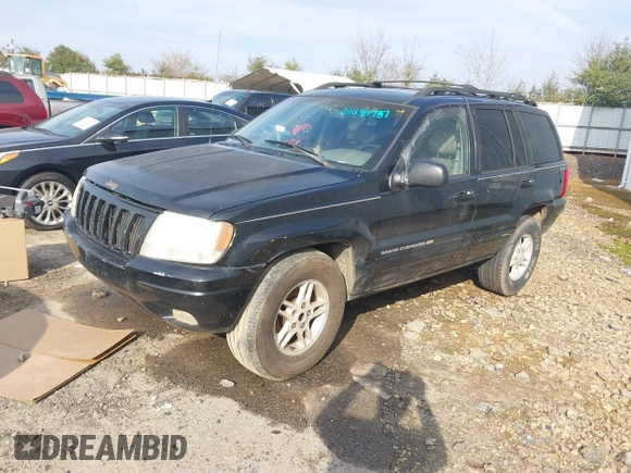 1999 Jeep Grand Cherokee Limited with VIN 1J4GW68S8XC588500, listed as a IAAI auction lot 41484787 with 161,961 mi miles. Bid and sale history available at carsss.com. Image 2.