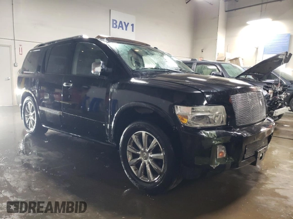 2010 Infiniti QX56 with VIN 5N3ZA0NC9AN906615, listed as a Copart auction lot 50917045 with 248,579 mi miles and Salvage Title. Bid and sale history available at DreamBid. Image 4.