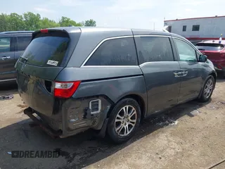 2012 Honda Odyssey EX-L with VIN 5FNRL5H67CB041252, listed as a IAAI auction lot 42158494 with 152,940 mi miles and . Bid and sale history available at DreamBid. Image 4.