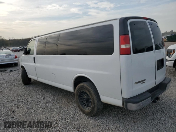 2014 Chevrolet Express Passenger LT with VIN 1GAZG1FG3E1205688, listed as a Copart auction lot 50937455 with 125,906 mi miles and Salvage title. Bid and sale history available at DreamBid. Image 2.