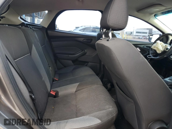 2012 Ford Focus SE z VIN 1FAHP3K24CL338153, wystawiony jako Copart lot #56161925 z przebiegiem 167 146 mil mil oraz Szkoda całkowita • Salvage title. Historia ofert i sprzedaży dostępna na DreamBid. Obrazek 10.