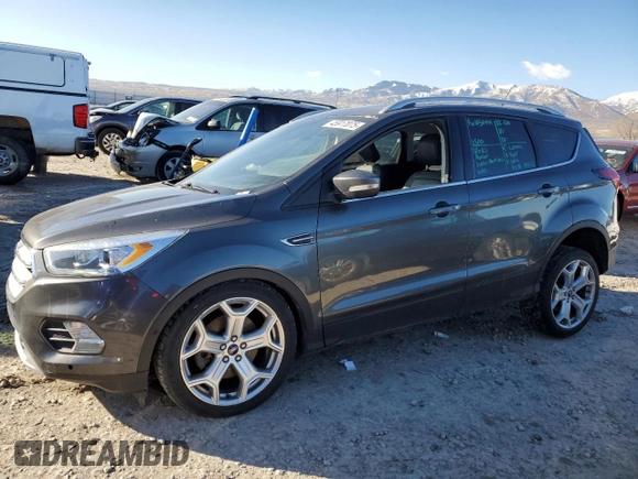 2019 Ford Escape Titanium with VIN 1FMCU9J90KUA00316, listed as a Copart auction lot 45917075 with 84,331 mi miles and Salvage Title. Bid and sale history available at carsss.com. Image 1.