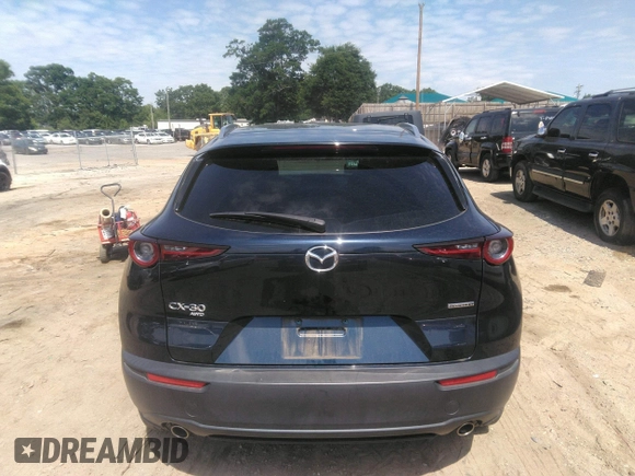 2022 Mazda CX-30 S Carbon Edition with VIN 3MVDMBCL6NM423255, listed as a IAAI auction lot 42209829 with 51,589 mi miles and . Bid and sale history available at DreamBid. Image 16.