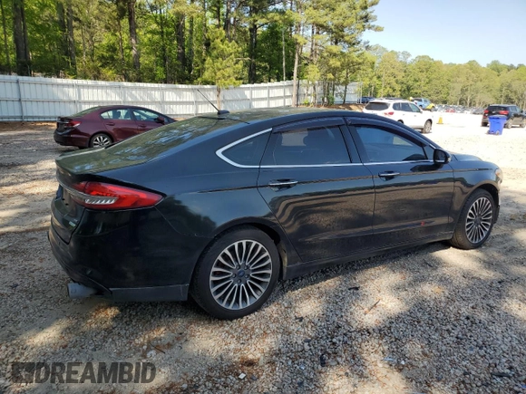 2017 Ford Fusion SE z VIN 3FA6P0H98HR328552, wystawiony jako Copart lot #52709395 z przebiegiem 188 451 mil mil oraz Szkoda całkowita • Salvage title. Historia ofert i sprzedaży dostępna na DreamBid. Obrazek 3.
