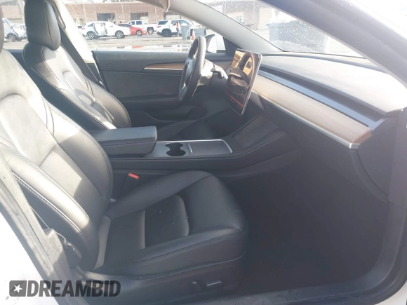 2021 Tesla Model 3 Long Range with VIN 5YJ3E1EB9MF055990, listed as a IAAI auction lot 41584065 with 49,147 mi miles and . Bid and sale history available at carsss.com. Image 5.