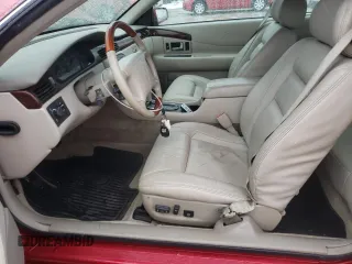 2001 Cadillac Eldorado ESC z VIN 1G6EL12Y61B107519, wystawiony jako Copart lot #38051744 z przebiegiem 52 018 mil mil oraz Czysty tytuł • Clean title. Historia ofert i sprzedaży dostępna na DreamBid. Obrazek 7.