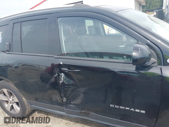 2016 Jeep Compass Latitude with VIN 1C4NJDEB2GD746067, listed as a IAAI auction lot 40512860 with 119,360 mi miles. Bid and sale history available at carsss.com. Image 14.