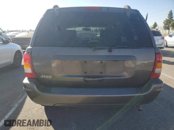 1999 Jeep Grand Cherokee Limited with VIN 1J4G268SXXC759016, listed as a Copart auction lot 80307534 with 215,870 mi miles and Salvage title. Bid and sale history available at DreamBid. Image 6.