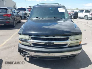 2003 Chevrolet Suburban LT z VIN 3GNGC26G83G210035, wystawiony jako IAAI lot #42084859 z przebiegiem 145 919 mil mil oraz . Historia ofert i sprzedaży dostępna na DreamBid. Obrazek 12.