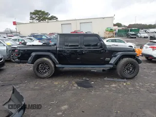 2022 Jeep Gladiator High Altitude z VIN 1C6HJTFG1NL164764, wystawiony jako IAAI lot #41727357 z przebiegiem 28 222 mil mil oraz . Historia ofert i sprzedaży dostępna na DreamBid. Obrazek 13.