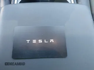 2023 Tesla Model 3 with VIN 5YJ3E1EA7PF592966, listed as a IAAI auction lot 41879794 with 13,423 mi miles and . Bid and sale history available at carsss.com. Image 11.