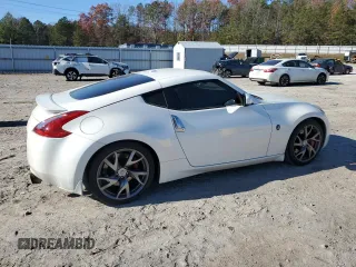 2014 Nissan 370Z Touring with VIN JN1AZ4EH1EM635411, listed as a Copart auction lot 82670344 with 77,501 mi miles and Salvage Title. Bid and sale history available at carsss.com. Image 3.