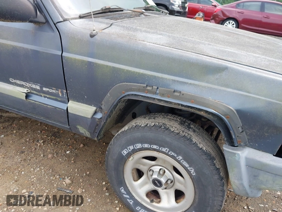 2001 Jeep Cherokee with VIN 1J4FT47S11L609530, listed as a IAAI auction lot 42222446 with 156,408 mi miles and . Bid and sale history available at DreamBid. Image 6.