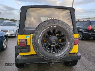 2003 Jeep Wrangler Sport with VIN 1J4FA49S93P373532, listed as a Copart auction lot 74595774 with 105,018 mi miles and Non Repairable. Bid and sale history available at carsss.com. Image 6.